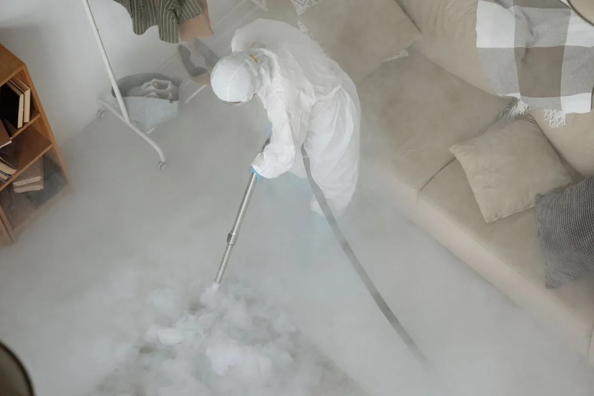 Biohazard cleanup technician in protective equipment, North Pole, AK